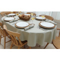 Oval table white table cloth champagne dinner